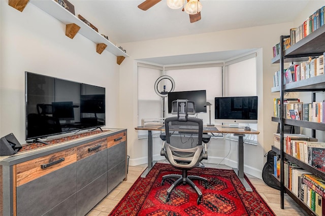 office area with ceiling fan