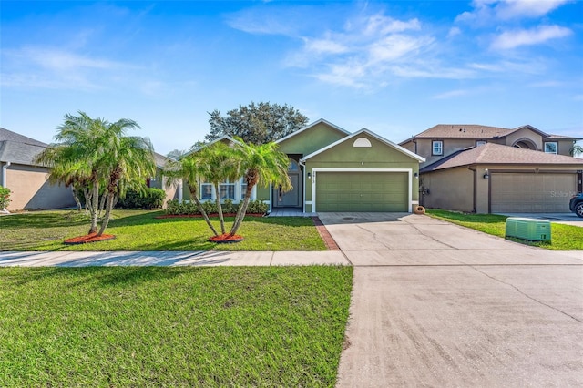 view of front of property with a garage and a front lawn