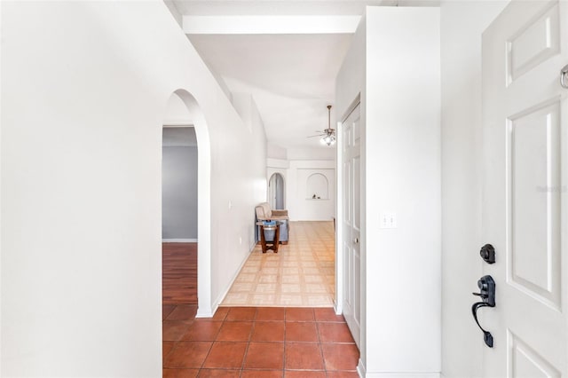 corridor with tile patterned flooring