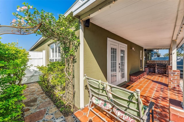 view of patio featuring french doors