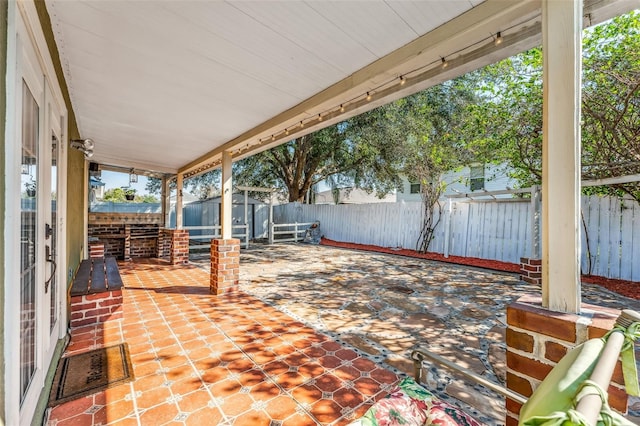 view of patio with a shed