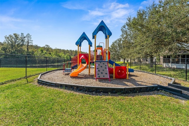 view of jungle gym with a yard