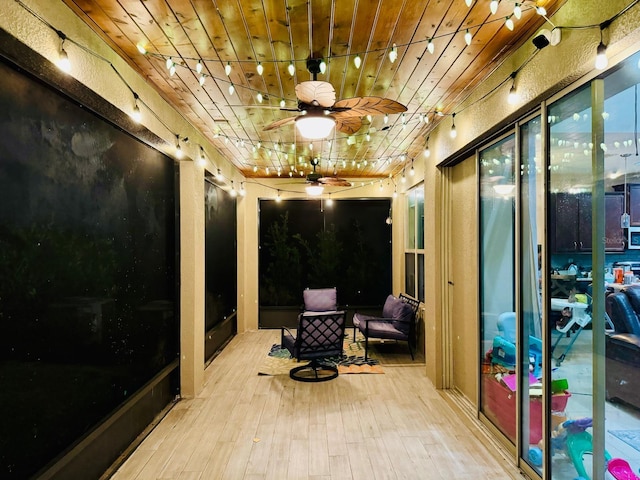 hall featuring wooden ceiling and light wood-type flooring