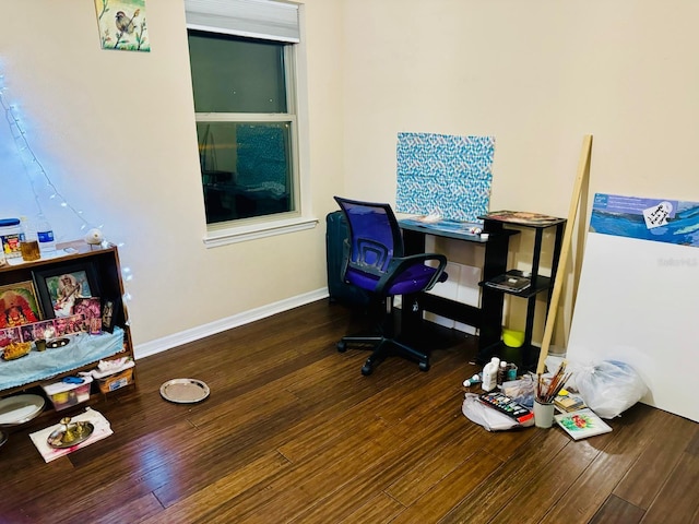 office space with dark hardwood / wood-style flooring