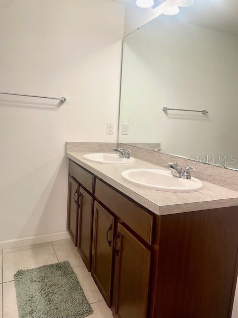 bathroom featuring vanity and tile patterned floors