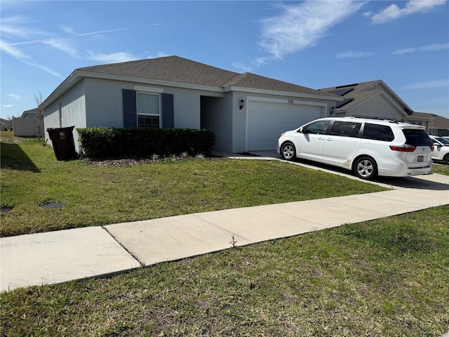 ranch-style house featuring a front yard, a garage, and stucco siding