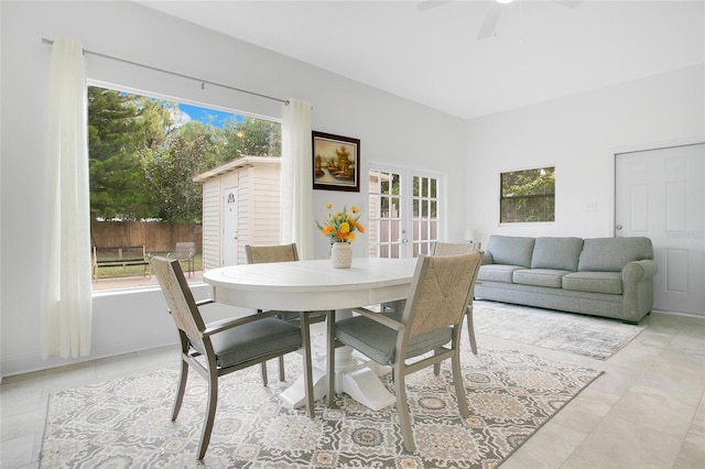 dining space featuring ceiling fan