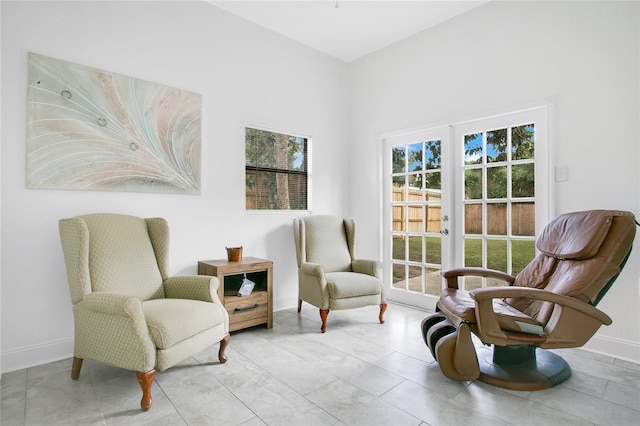 sitting room featuring light tile patterned flooring