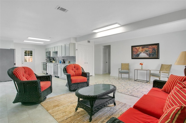 living room with sink