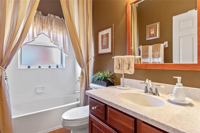 full bathroom with vanity, toilet, and shower / bath combo