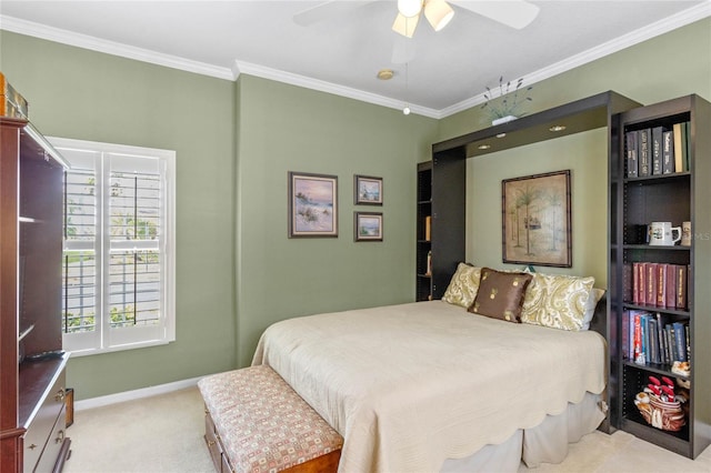 bedroom featuring light carpet, ceiling fan, and crown molding