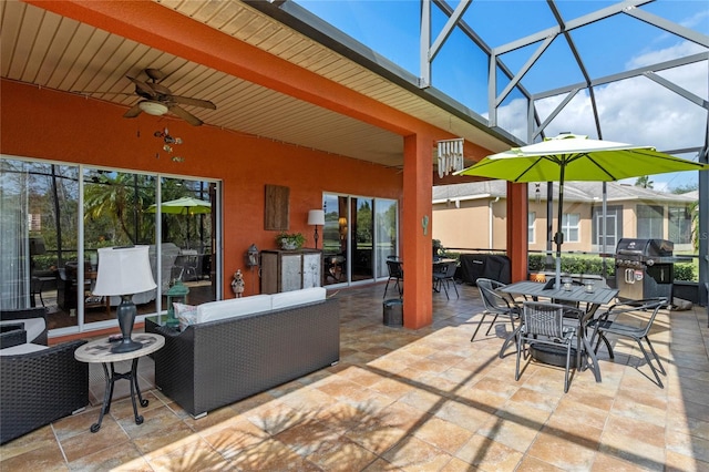 view of patio featuring ceiling fan, a grill, a lanai, and an outdoor living space