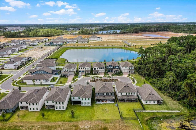 bird's eye view with a residential view and a water view