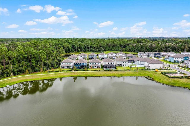 birds eye view of property featuring a residential view and a water view