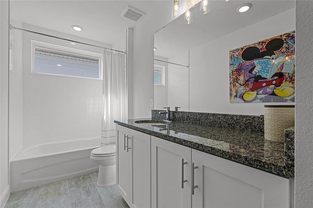 full bathroom featuring toilet, recessed lighting, shower / tub combo, vanity, and visible vents