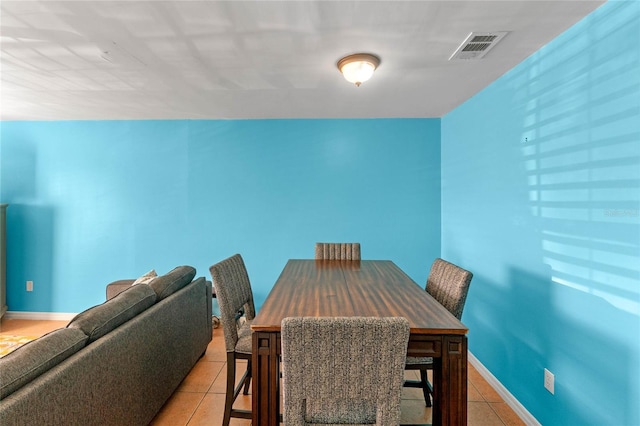 view of tiled dining space