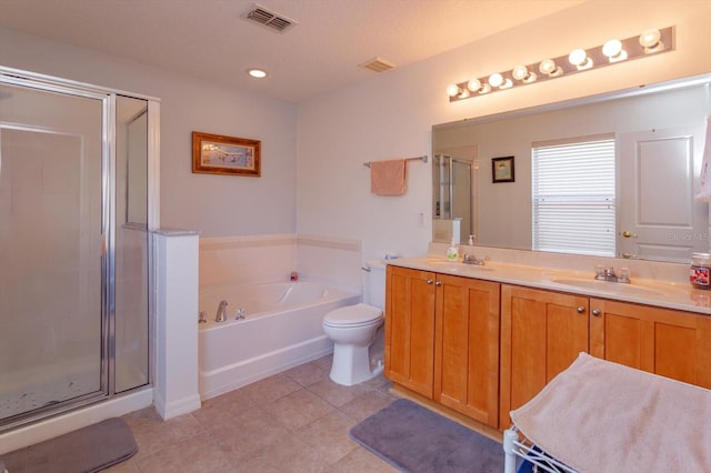 full bathroom with toilet, shower with separate bathtub, vanity, and tile patterned floors