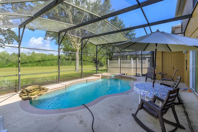 view of swimming pool featuring a patio area, an in ground hot tub, and glass enclosure