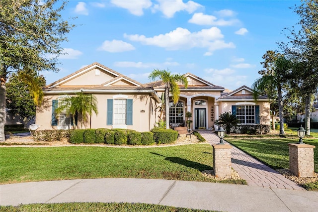 view of front of home with a front yard