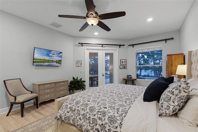 bedroom featuring access to outside, light hardwood / wood-style flooring, and ceiling fan