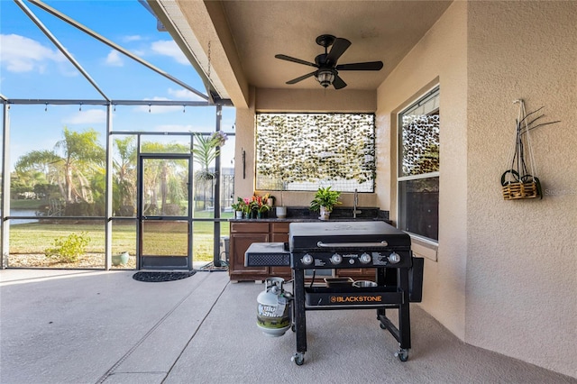 sunroom / solarium with ceiling fan