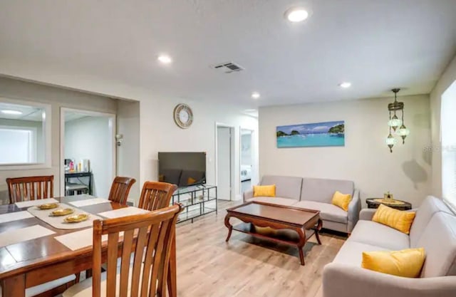 living room featuring light wood-type flooring