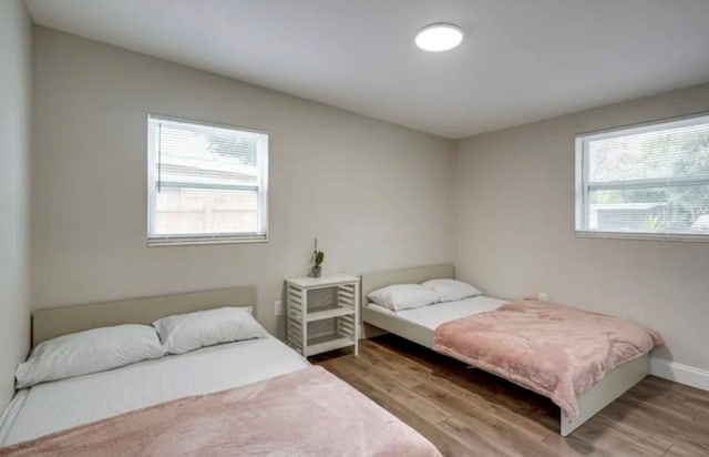 bedroom featuring hardwood / wood-style floors