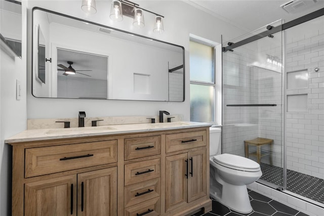 bathroom with tile patterned floors, vanity, toilet, crown molding, and an enclosed shower