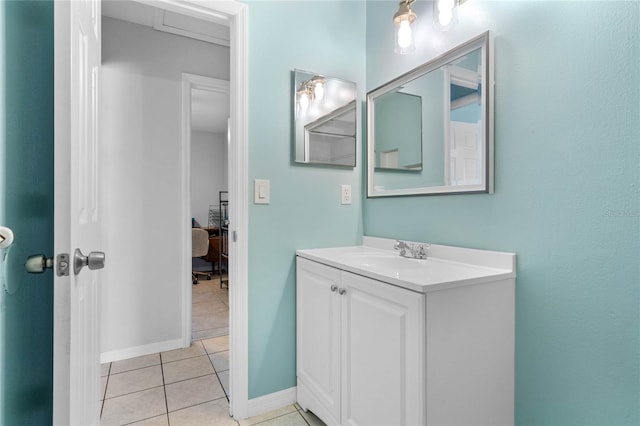 bathroom with tile patterned flooring and vanity