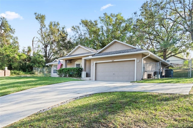 ranch-style home with a front yard and a garage