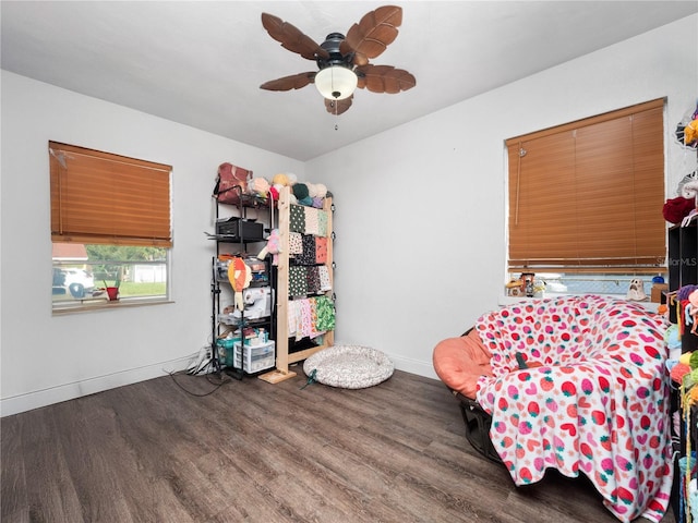 sitting room featuring hardwood / wood-style flooring and ceiling fan