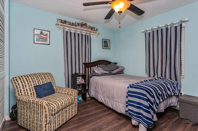 bedroom featuring ceiling fan and dark hardwood / wood-style flooring