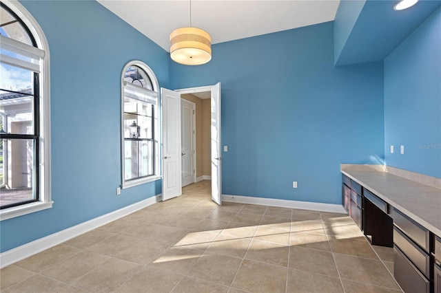 interior space featuring light tile patterned floors