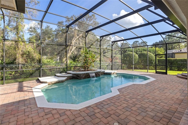 view of pool featuring a lanai, a patio area, and pool water feature