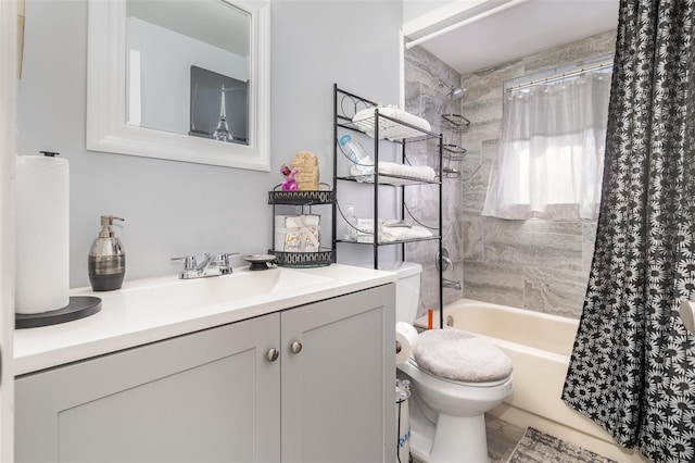 full bathroom featuring vanity, toilet, and shower / bath combo with shower curtain