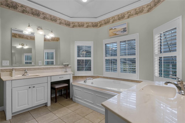 bathroom with ornamental molding, vanity, a tub to relax in, and tile patterned floors