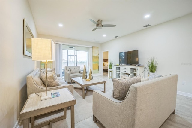 living room with ceiling fan