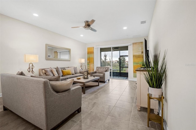 living room with light tile patterned floors and ceiling fan