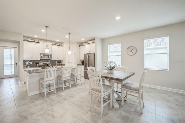 view of tiled dining area