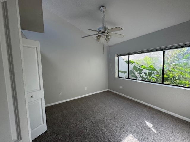 13619 Twin Lakes Ln Unit 15, Tampa, FL 33618 - unfurnished room with dark colored carpet, baseboards, and ceiling fan