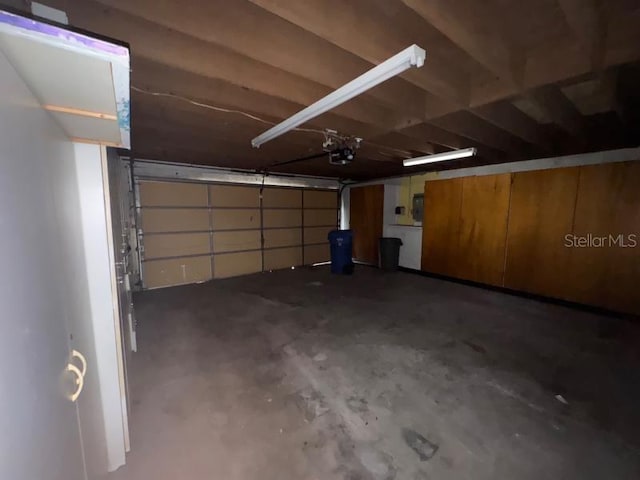 garage featuring a garage door opener