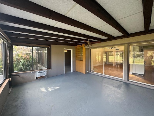 13619 Twin Lakes Ln Unit 15, Tampa, FL 33618 - unfurnished sunroom with beamed ceiling, ceiling fan, and an AC wall unit