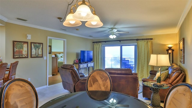 dining space featuring light hardwood / wood-style flooring, ceiling fan, and crown molding