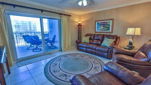 living room featuring light tile patterned floors, ceiling fan, and crown molding