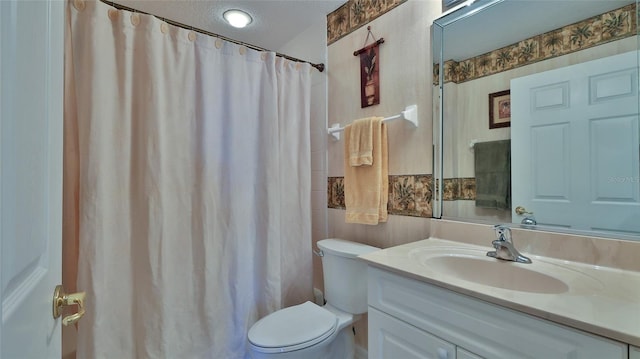 5300 S Atlantic Ave Unit 2-502, New Smyrna Beach, FL 32169 - full bathroom with toilet, vanity, and a shower with shower curtain