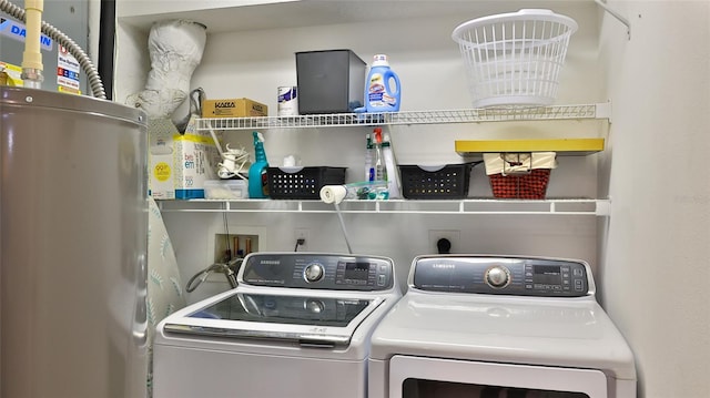 5300 S Atlantic Ave Unit 2-502, New Smyrna Beach, FL 32169 - washroom with washer and clothes dryer and gas water heater