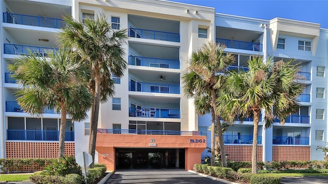 5300 S Atlantic Ave Unit 2-502, New Smyrna Beach, FL 32169 - view of apartment building / complex with an attached garage