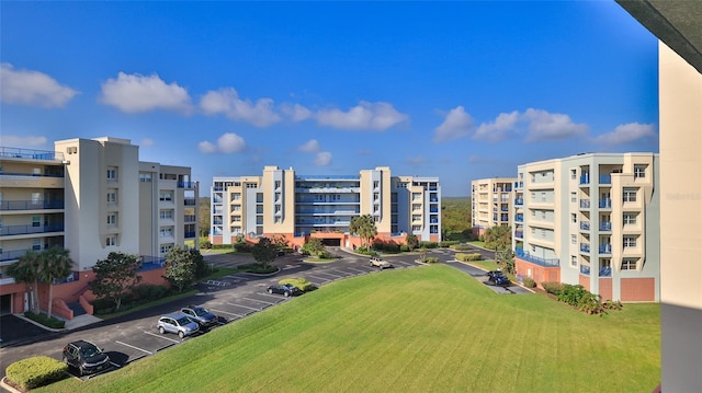 5300 S Atlantic Ave Unit 2-502, New Smyrna Beach, FL 32169 - view of apartment building / complex with uncovered parking