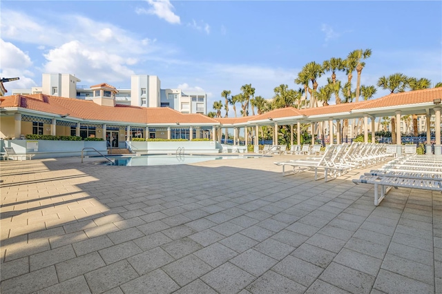 view of pool featuring a patio area