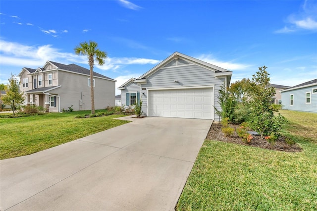 view of front of home featuring a garage and a front lawn